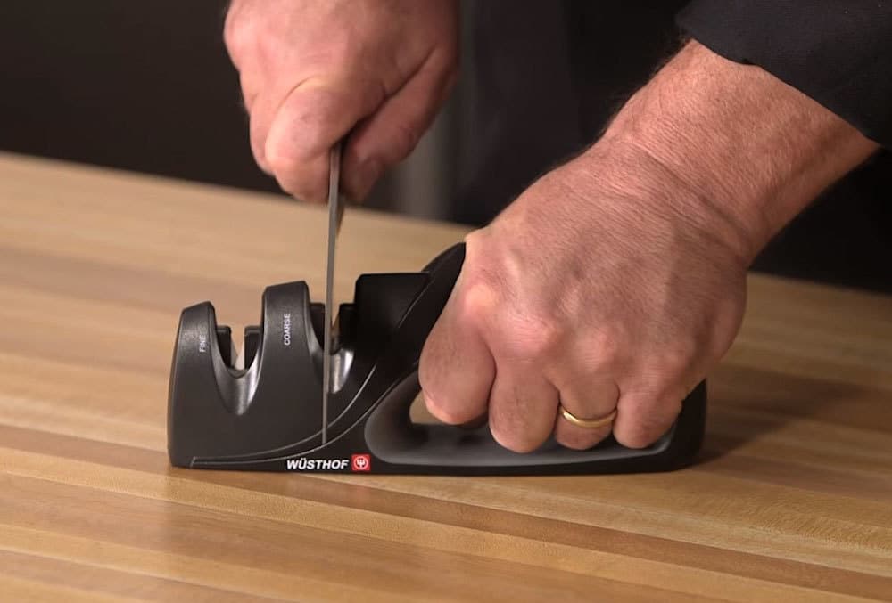 how to use a handheld knife sharpener